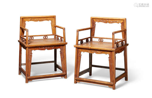 A pair of huanghuali lowback armchairs, meiguiyi   20th century