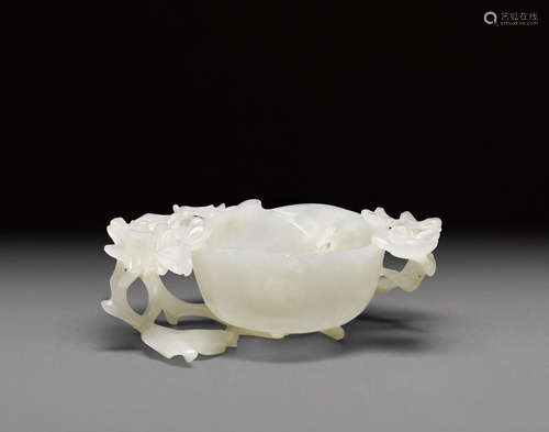 A carved jade floriform libation cup   Qing dynasty