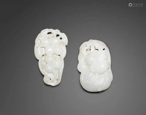 Two carved jade pendants