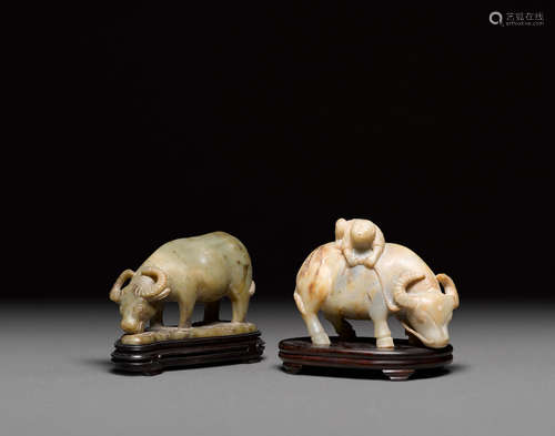 Two carved hardstone water buffalo   20th century