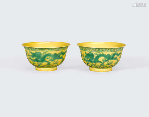 A pair of yellow and green-enameled dragon bowls  Qianlong mark, 20th century