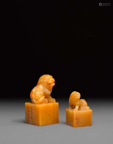 Two yellow soapstone seals