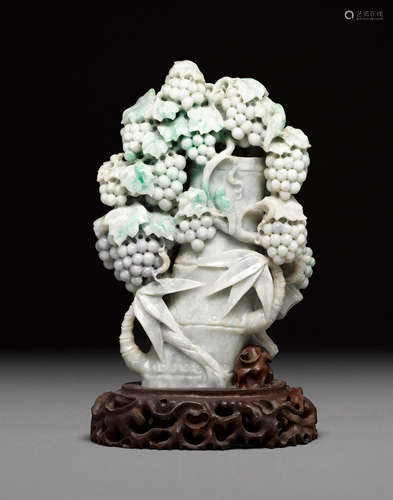 A GREEN AND LAVENDER JADEITE 'GRAPES AND BAMBOO' CARVING   20th century