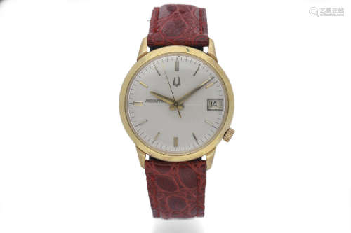 Bulova. A 14K Yellow Gold Electronic Wristwatch with Date
