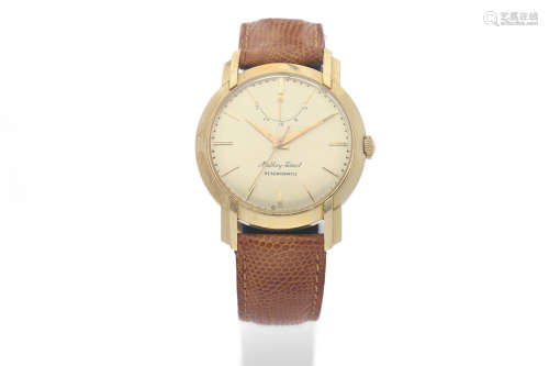 Mathany Tissot. A Yellow Gold Centre Seconds Wristwatch with Power Reserve Indication