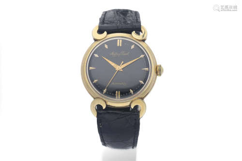 Mathey-Tissot. A 14K Yellow Gold Wristwatch with Unusual Lugs and Black Dial
