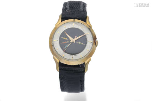 Hamilton. A Gold Plated and Stainless Steel Wristwatch with 5 Time Zones and Two-Tone Dial