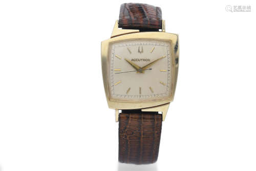 Bulova. A 14K Yellow Gold Electronic Wristwatch