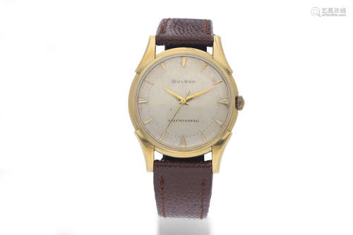 Bulova. A 14K Yellow Gold 'Self-Winding' Wristwatch