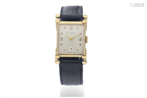 Bulova. A 14K Yellow Gold Rectangular Wristwatch with Unusual Lugs