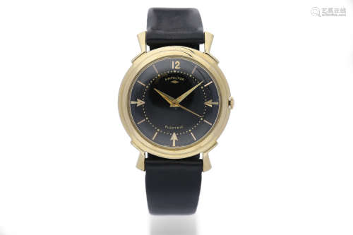 Hamilton. A Yellow Gold Centre Seconds Electric Wristwatch with Black Dial