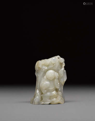 Qing dynasty A small carved jade figural group of Liu Hai