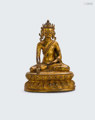 Tibet, 15th/16th century A gilt metal alloy figure of Akshobya