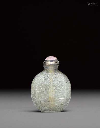 18th century A pale green glass 'dragon' snuff bottle