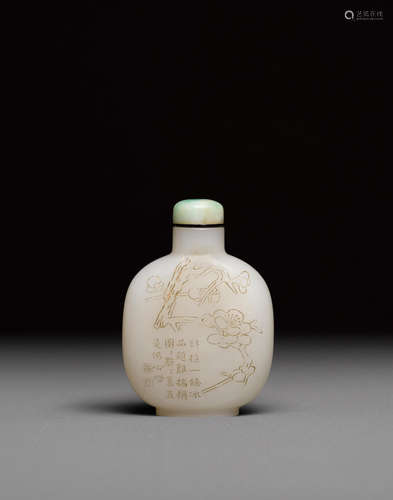 Late 18th/19th century An inscribed white jade 'prunus' snuff bottle