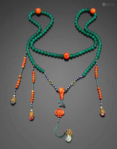 Late Qing dynasty A green hardstone and coral court necklace, chao zhu