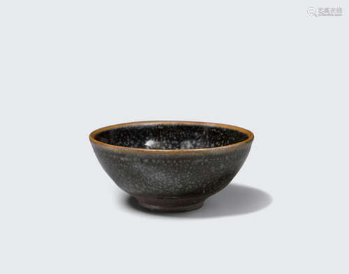 Jin dynasty A small black glazed bowl with metallic 'oil spot' decoration