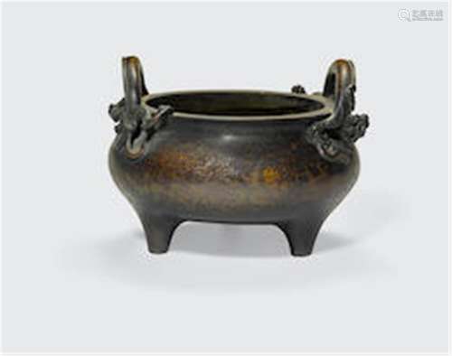 Zhengde mark, 18th century A bronze incense burner with dragon handles