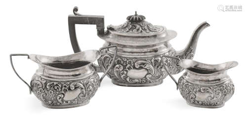 by John Edward Wilmot, Birmingham, 1899  An English sterling silver three-piece assembled tea service