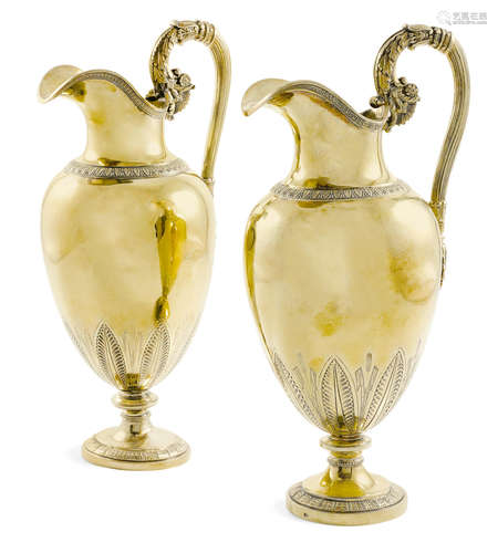 one by Henry Chawner, London, 1821, and one with French marks,  19th century  A near pair of gilt silver ewers