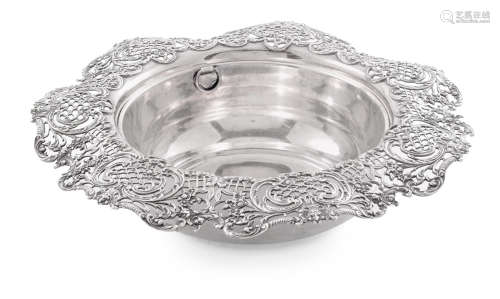 by Shreve & Co., San Francisco, CA, 20th Century  An American sterling silver serving bowl with pierced scrolling foliate rim