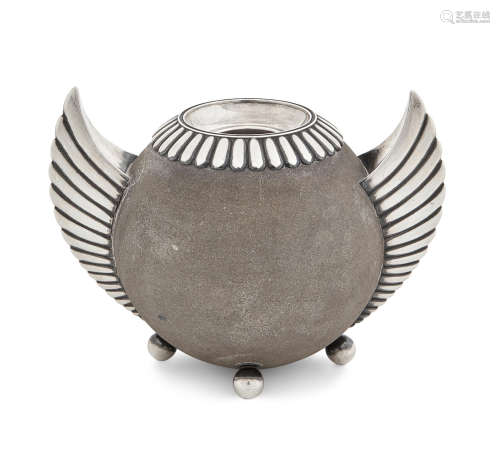 marked Fabregé, with the workmasters mark of Julius Rappoport, St. Petersburg, circa 1890  A Russian silver-mounted sandstone winged match holder and strike