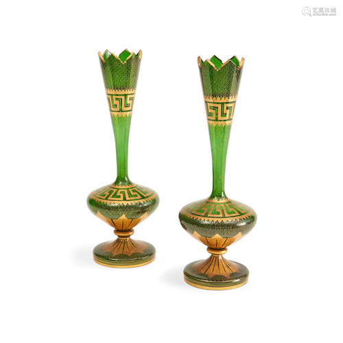 Late 19th century A pair of Bohemian gilt decorated green glass tall vases