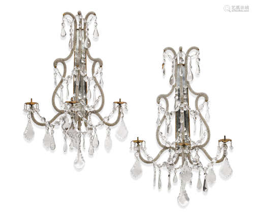 Circa 1940 A pair of Italian beaded, cut glass and bronze four light sconces