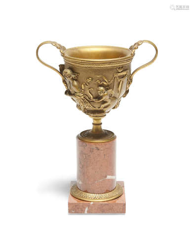 A Gilt-bronze pedestal vase cast after a Pompeiian Kantharos