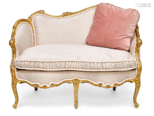 19th century A Louis XV style giltwood small canapé