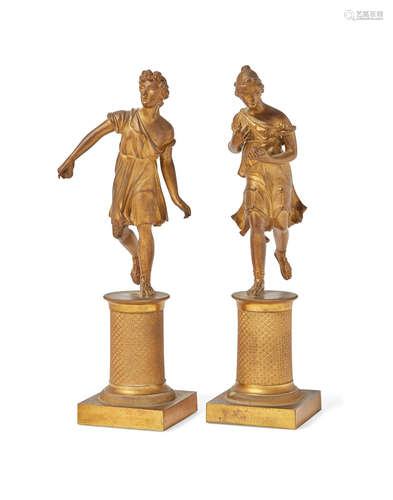 First quarter 19th century A Pair of Empire Gilt Bronze Figures of Atalanta and Melanion