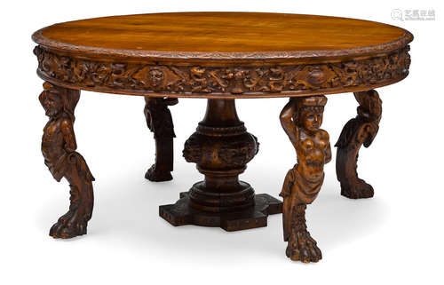 Late 19th century A Continental Renaissance revival carved walnut dining table