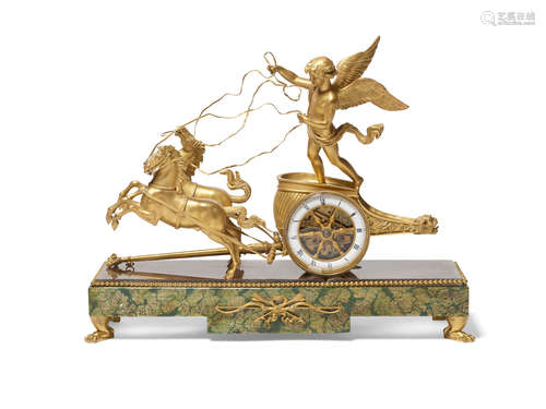 late 19th/early 20th century An Empire style gilt bronze and reverse painted glass figural mantel clock