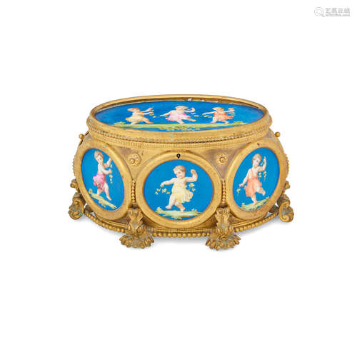 Late 19th century An Italian Neoclassical style gilt metal and polychromed porcelain mounted oval box