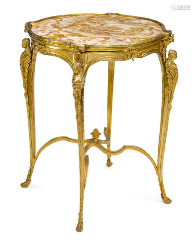 20th century A Louis XV style gilt bronze and marble table