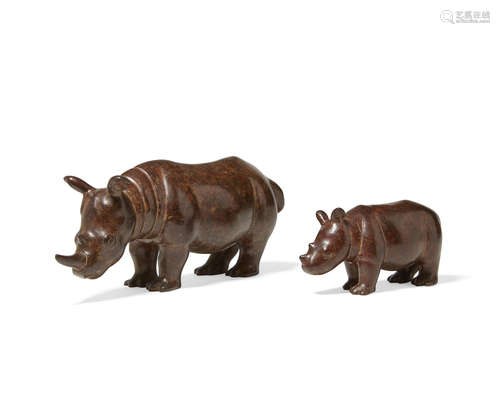 A companion pair of patinated bronze rhinocerosAnita Mandl (British, born 1926)