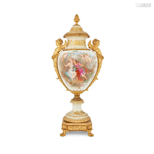 Late 19th century A Sèvres style gilt bronze mounted polychromed porcelain covered urn