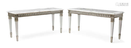 In the style of Maison Jansen, 20th century Pair of Neoclassical Style Marble Top Silver Giltwood White Painted Wood Pier Tables