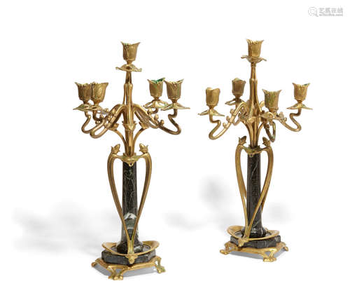 Circa 1900 A Pair of Art Nouveau bronze and verde antico marble five light candelabra