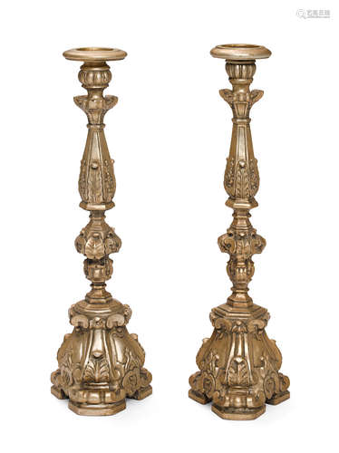 20th century A pair of Italian Baroque style carved giltwood floor prickets