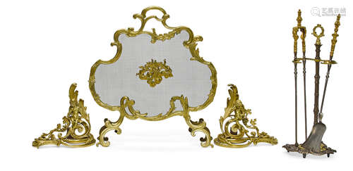 An assembled six piece set of Louis XV style gilt bronze fireplace equipment