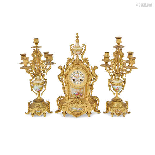 Late 19th century A Napoleon III gilt metal and porcelain mounted three piece clock garniture