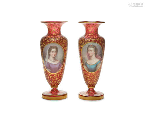 Late 19th century A pair of Bohemian parcel gilt and enameled ruby glass  portrait vases