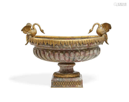 Late 19th/early 20th century A French gilt bronze mounted Breche violette marble centerpiece