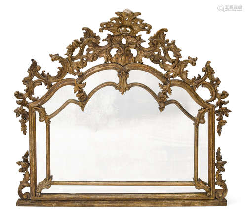 MId 18th century An Italian Rococo Silver Gilt Wood Overmantel Mirror