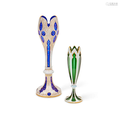 Late 19th/early 20th century Two Bohemian white cased cut through to cobalt or emerald glass vases