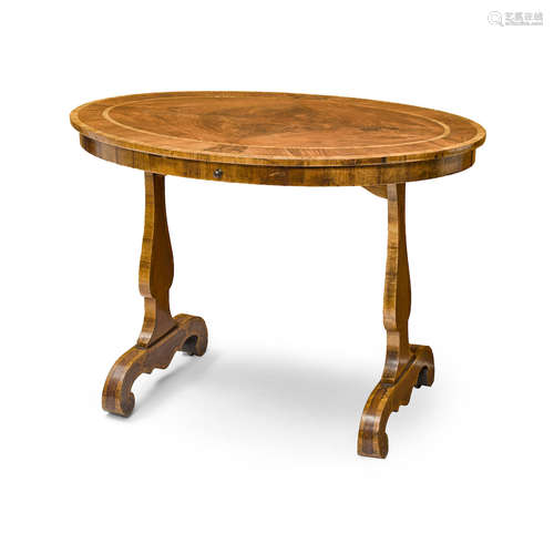 First quarter 19th century A Continental Neoclassical Crossbanded and Inlaid Mahogany and Walnut Center Table