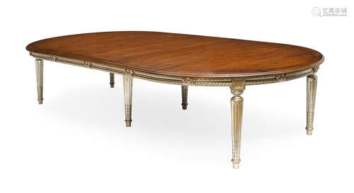 In the style of Maison Jansen, 20th century A Neoclassical Style Parcel Silver Giltwood and Mahogany Dining Table