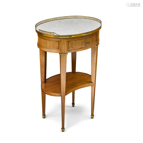 Fourth quarter 18th century A Louis XVI Marble Top Gilt Bronze Mounted Tulipwood Table a Ecrire