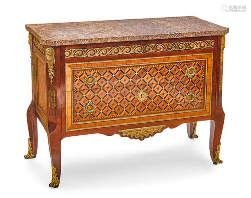 Early 20th century A Louis XVI Style Gilt Bronze Mounted Parquetry Inlaid Mahogany and fruitwood Commode